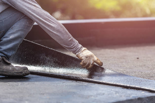 Professional Waterproofing technician working in Calera, AL